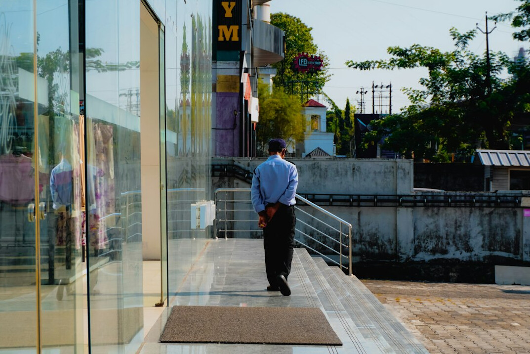 store detective monitoring shoppers