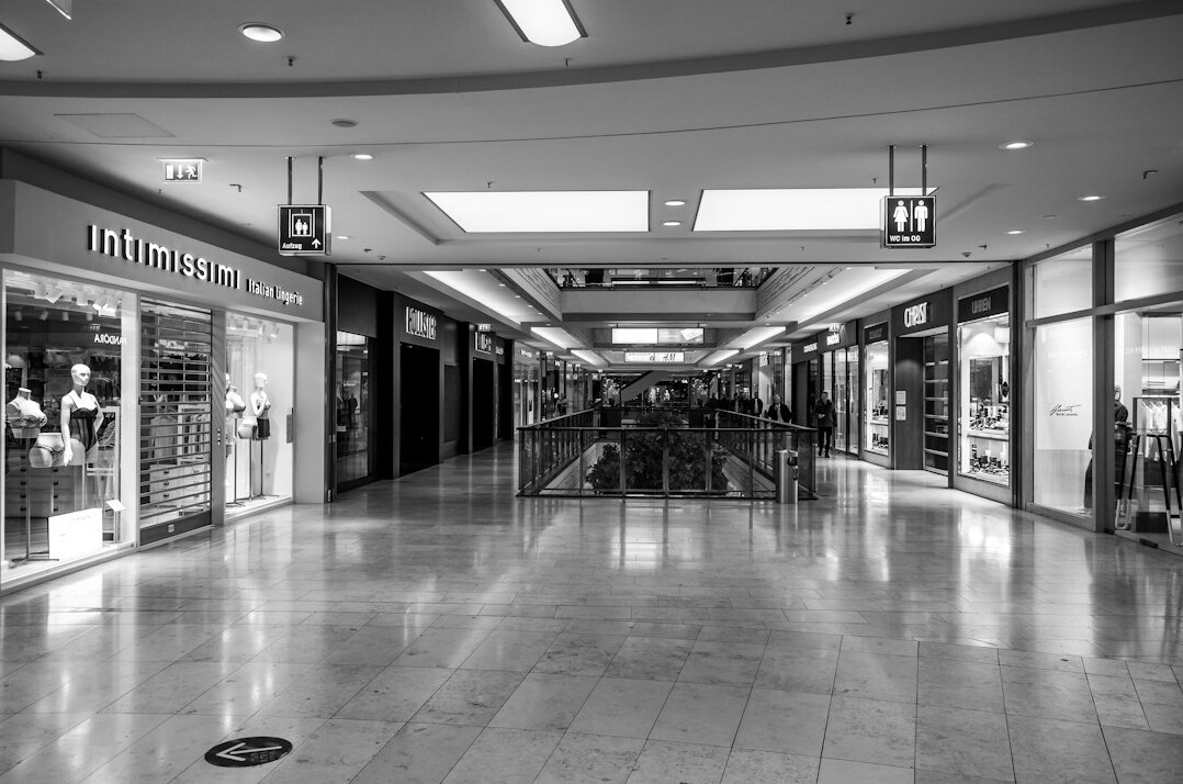 store detective watching crowd